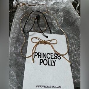 Princess Polly bow necklace gold tone new with tags adjustable  and gift bag